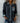 Le pull en maille parfait: chaleur, style et confort sans compromis